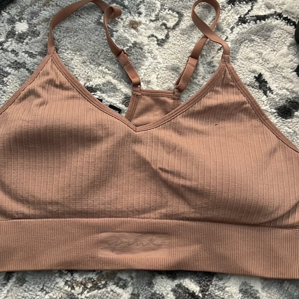 Pink activewear bra size medium tan color